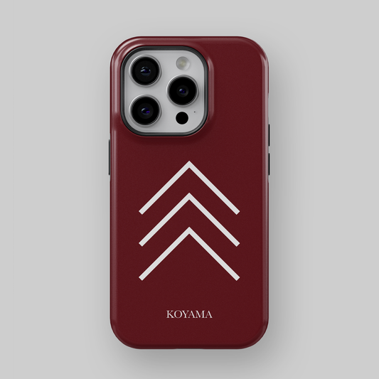burgundy phone case with white laima symbol